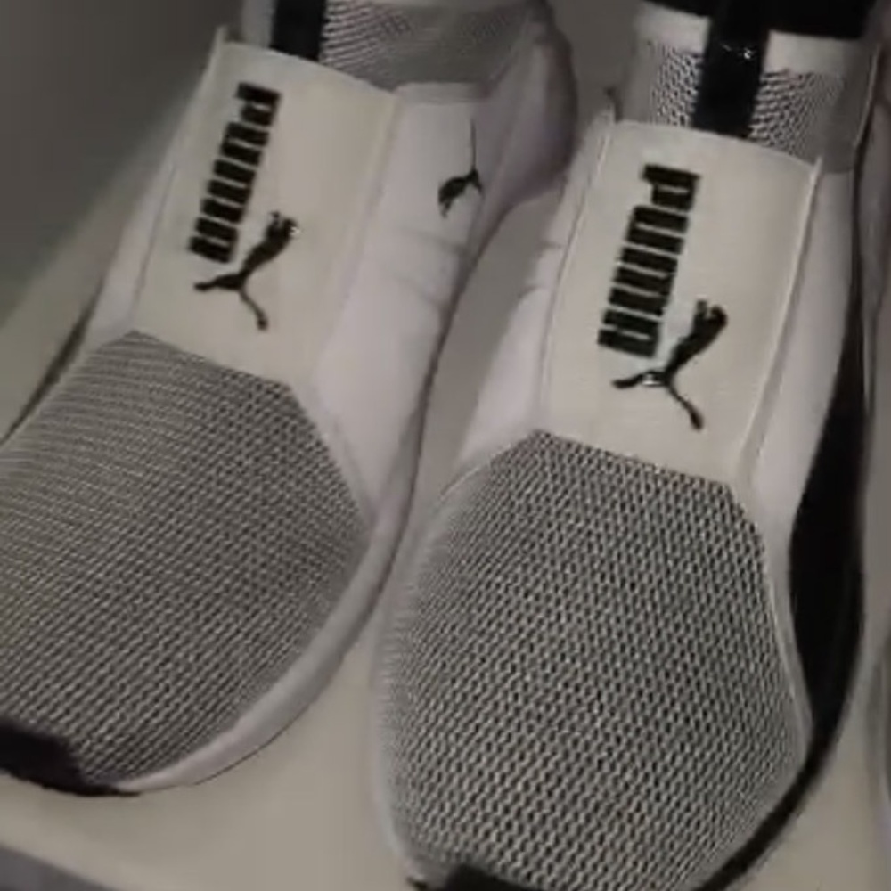Kylie Jenner black and white Pumas